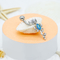 Blauer Edelstahl-Schlüsselform Opal Gem Body Piercing Jewelrys 14ga 316